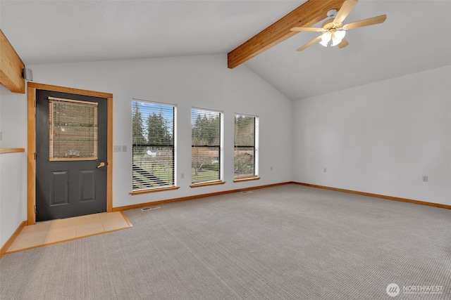 interior space with lofted ceiling with beams, visible vents, baseboards, and ceiling fan