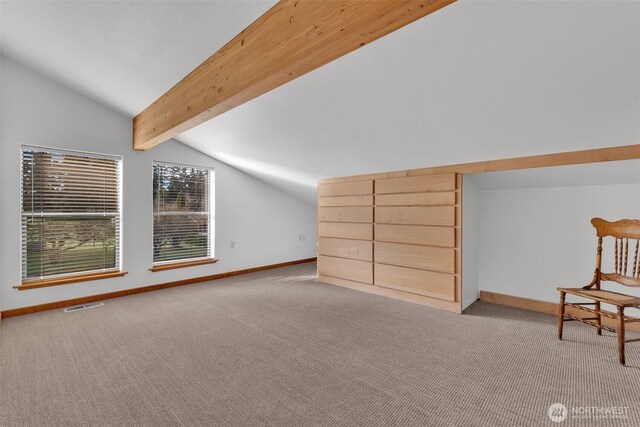 bonus room featuring baseboards, carpet, and vaulted ceiling with beams