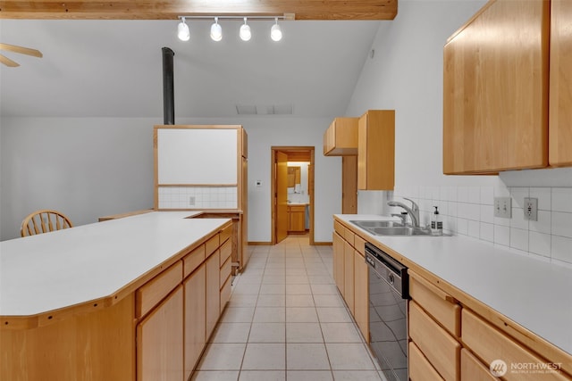 kitchen featuring a sink, backsplash, dishwasher, and light brown cabinets