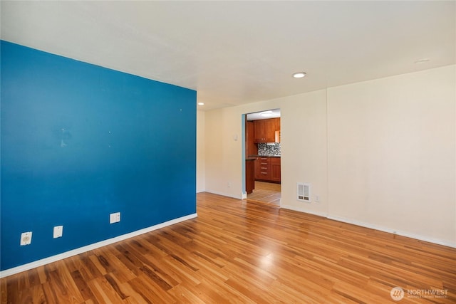 1314 N Callow Ave, Bremerton, WA 98312 - empty room featuring visible vents, recessed lighting, light wood finished floors, and baseboards