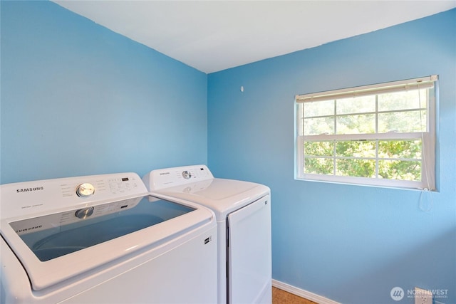 1314 N Callow Ave, Bremerton, WA 98312 - washroom with separate washer and dryer, baseboards, laundry area, and plenty of natural light