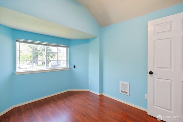 1314 N Callow Ave, Bremerton, WA 98312 - spare room with dark wood finished floors, baseboards, visible vents, and vaulted ceiling