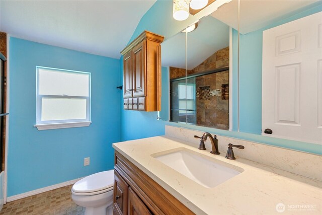 1314 N Callow Ave, Bremerton, WA 98312 - full bathroom with lofted ceiling, a tile shower, baseboards, toilet, and vanity