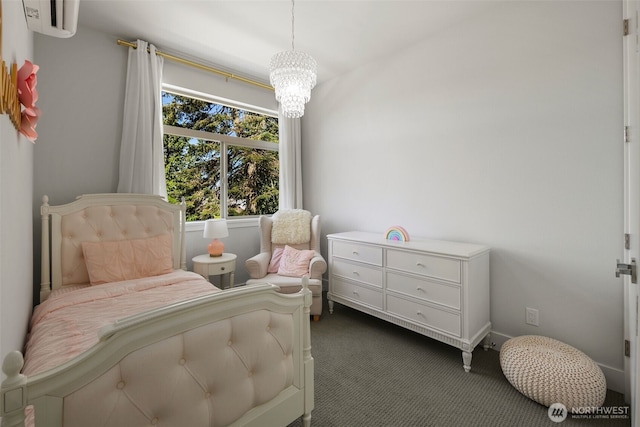 bedroom with an inviting chandelier and dark colored carpet