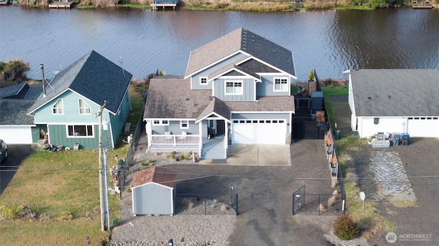 drone / aerial view with a water view