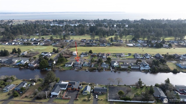 aerial view featuring a water view and a residential view