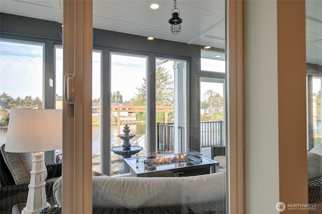 doorway to outside featuring recessed lighting