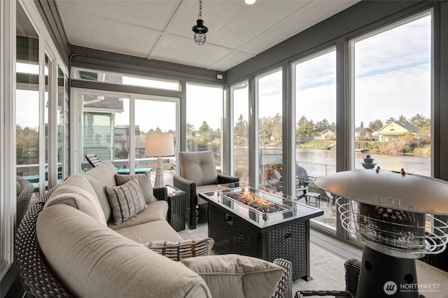 sunroom with a water view