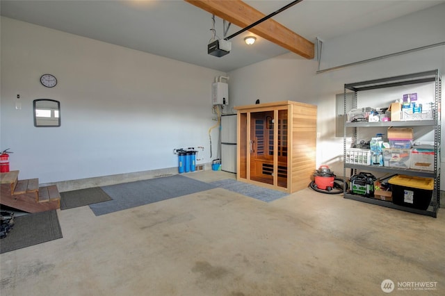 garage with a garage door opener, water heater, and fridge