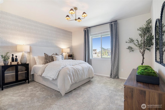 carpeted bedroom with a chandelier