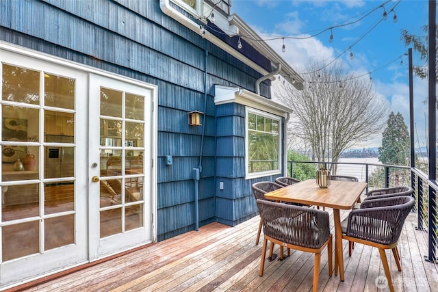 deck featuring outdoor dining area