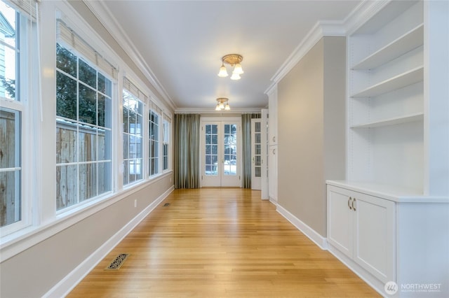 interior space with visible vents and an inviting chandelier