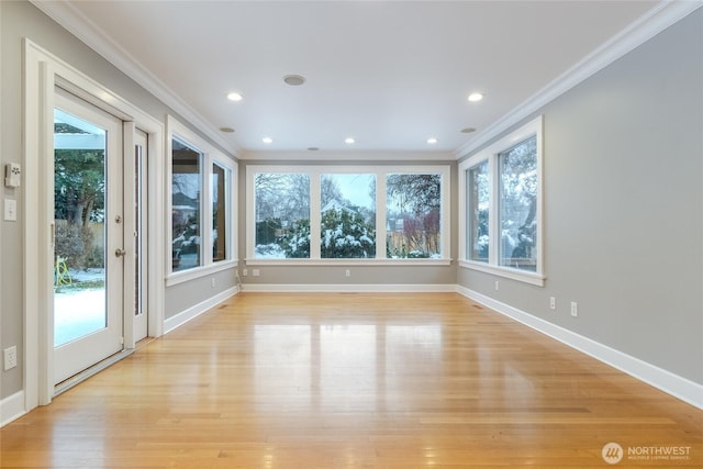 unfurnished sunroom featuring a healthy amount of sunlight