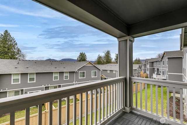 wooden deck featuring a residential view