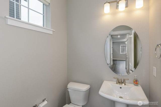 bathroom featuring a sink and toilet