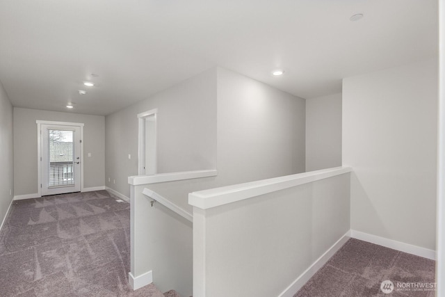 corridor with recessed lighting, carpet, an upstairs landing, and baseboards