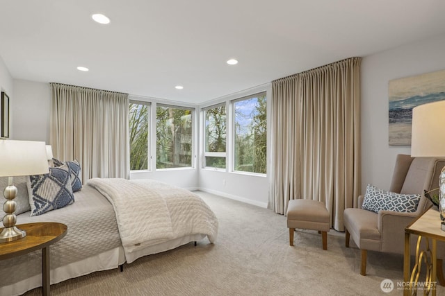 bedroom featuring light carpet, baseboards, and recessed lighting