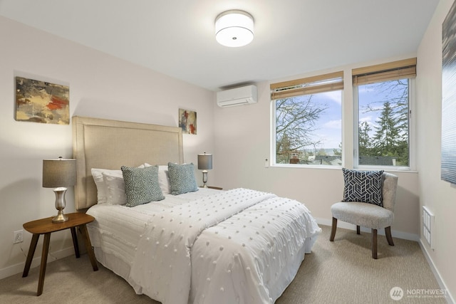 carpeted bedroom with a wall mounted air conditioner, visible vents, and baseboards