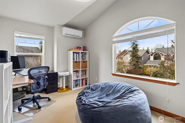 office space with a wall mounted air conditioner, baseboards, carpet flooring, and vaulted ceiling