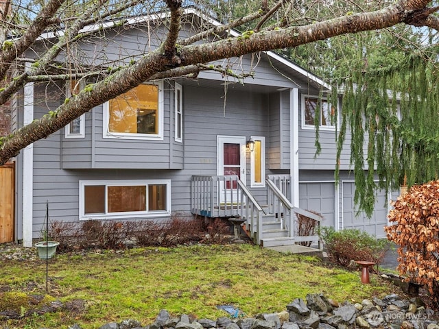 split foyer home featuring a garage