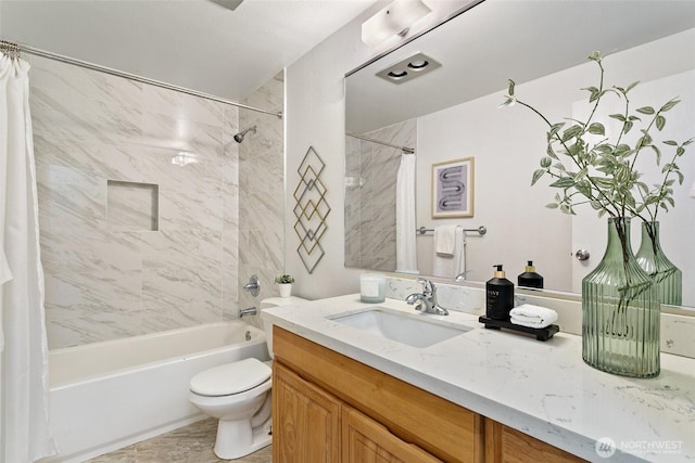 full bathroom with vanity, shower / bath combination with curtain, and toilet