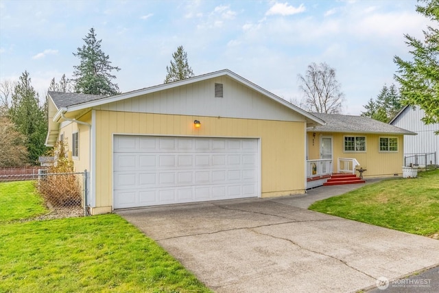 ranch-style home featuring fence, roof with shingles, an attached garage, a front lawn, and concrete driveway