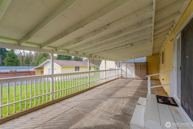 view of patio / terrace featuring fence