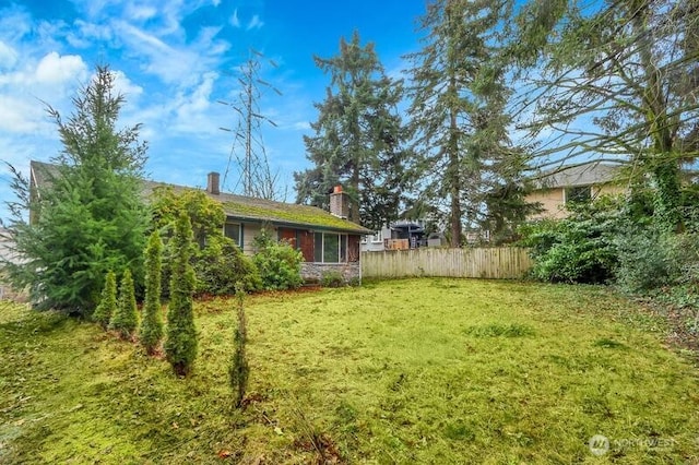 view of yard featuring fence