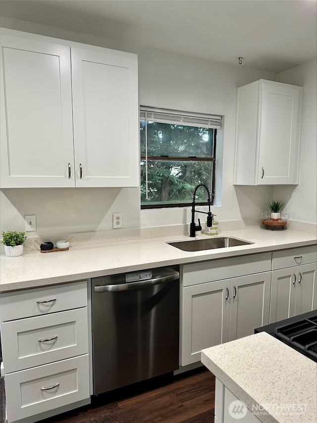 kitchen featuring a sink, white cabinetry, dark wood finished floors, and dishwasher