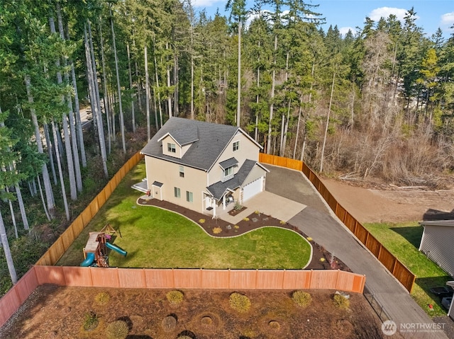 bird's eye view featuring a forest view