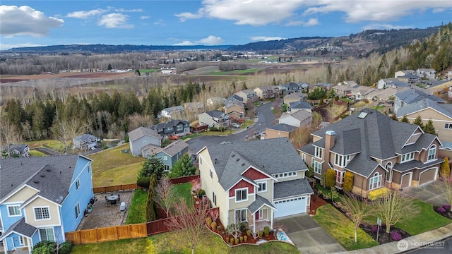 drone / aerial view with a mountain view and a residential view