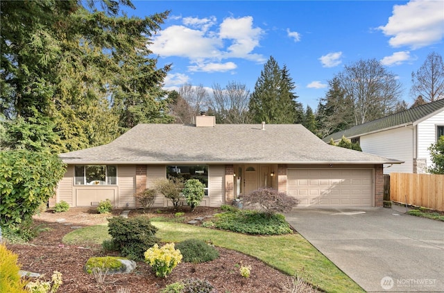 ranch-style house featuring a shingled roof, concrete driveway, a chimney, an attached garage, and fence