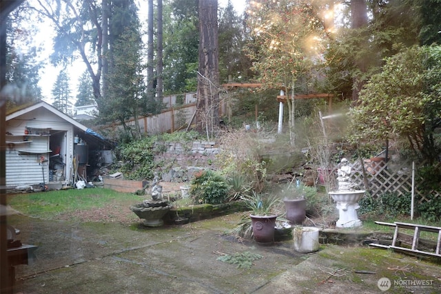 view of yard featuring fence