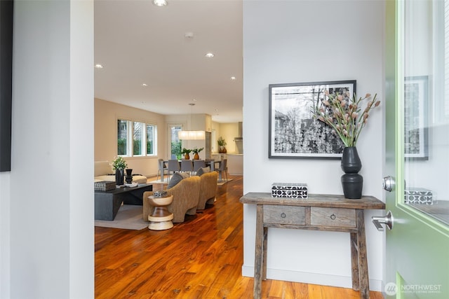 hall featuring recessed lighting and wood finished floors