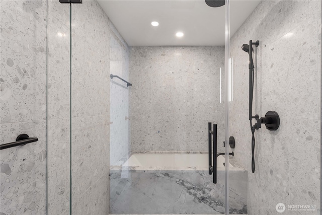 full bathroom with recessed lighting and a shower stall