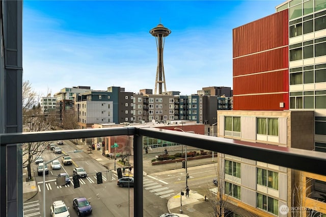 balcony featuring a city view