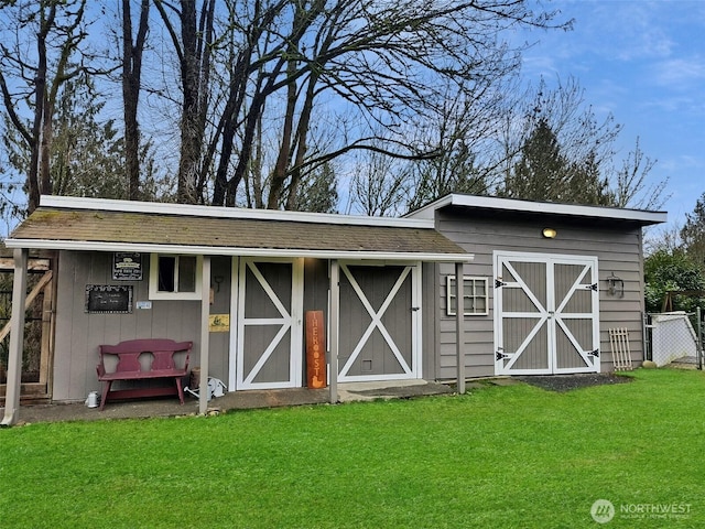 view of outbuilding featuring an outdoor structure