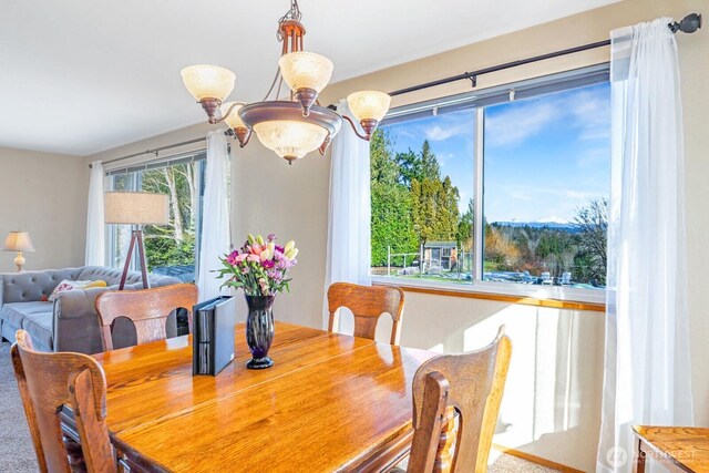 dining area with a chandelier