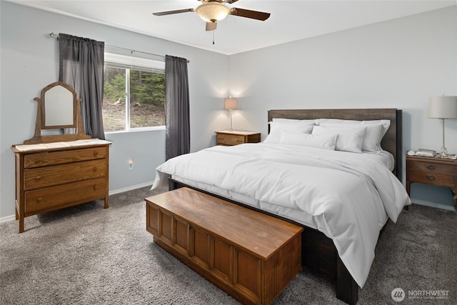 carpeted bedroom with ceiling fan and baseboards