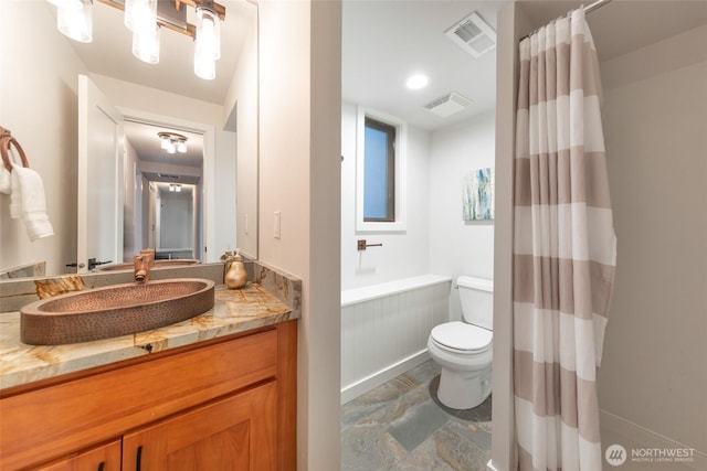 full bath featuring toilet, visible vents, and vanity