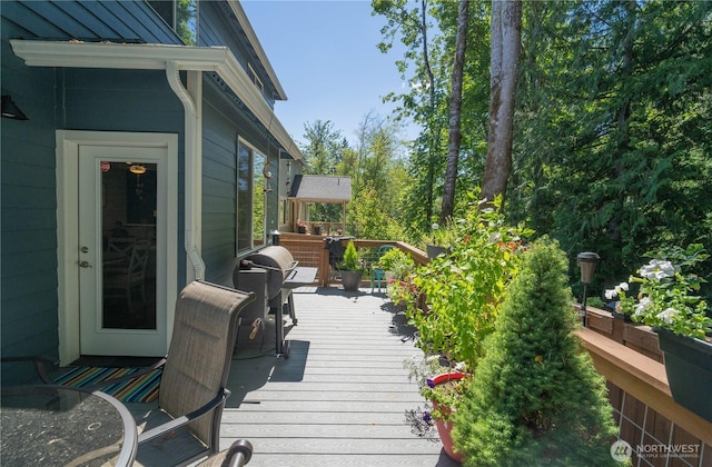 wooden terrace with grilling area