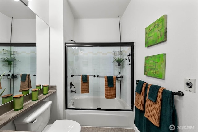 full bath with combined bath / shower with glass door and toilet