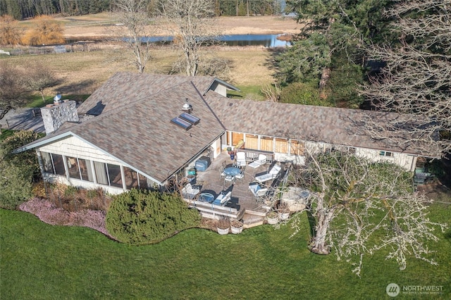bird's eye view with a water view