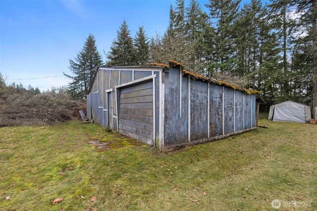 exterior space featuring an outbuilding