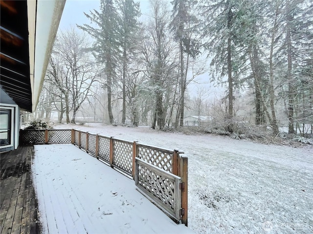 view of snow covered deck