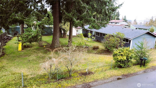 view of yard featuring fence