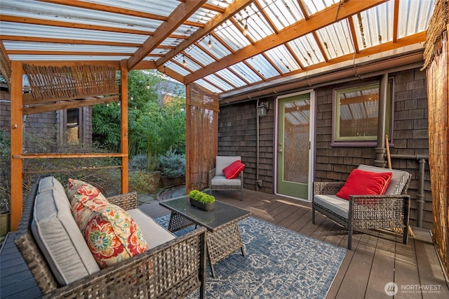 wooden deck featuring outdoor lounge area and a pergola