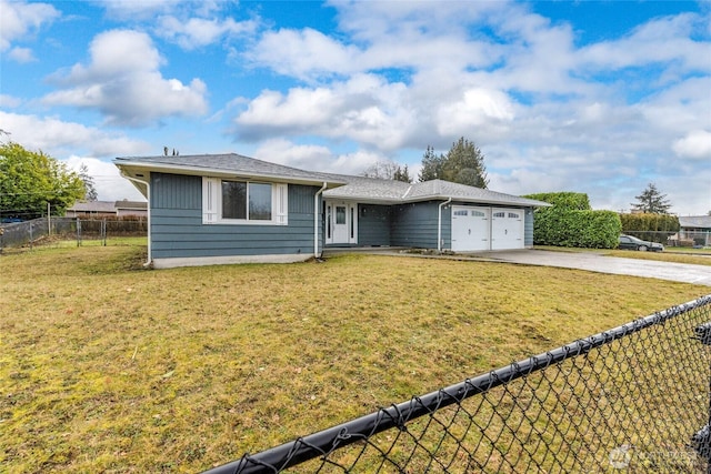 single story home featuring an attached garage, driveway, fence, and a front yard