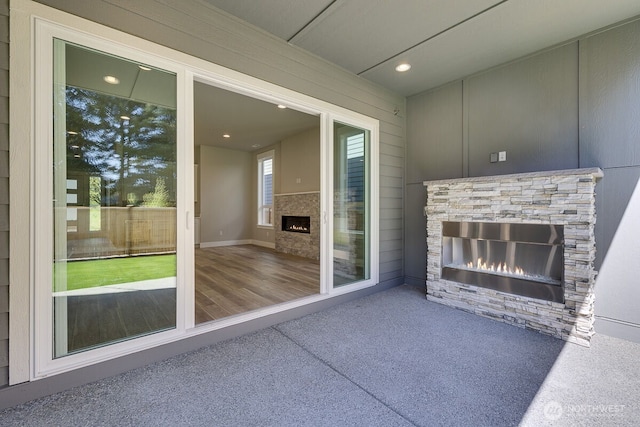 1424 238th St SE, Bothell, WA 98021 - view of patio / terrace with an outdoor stone fireplace