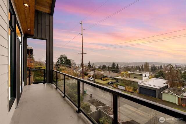 view of balcony at dusk